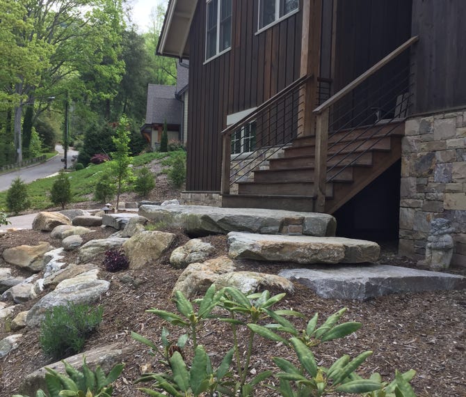 large boulder step landing residential landscape architecture